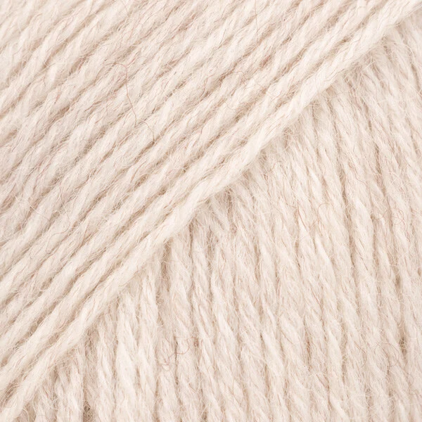 DROPS Fabel Uni Colour 124 Valkoinen hiekka